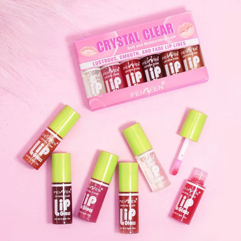 Six pcs of Blushimmer moisturizing lip glosses with transparent, hydrating lip oil and plumper effect on smooth lips.