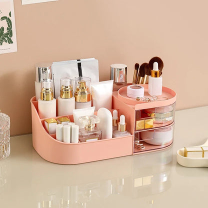 Blushimmer makeup storage box with compartments for cosmetics, jewelry, and nail polish, on a desktop surface.