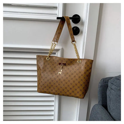 Women luxury tote bag with large capacity, printed design, shoulder strap, trendy handbag for shopping and everyday use.