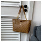 Women luxury tote bag with large capacity, printed design, shoulder strap, trendy handbag for shopping and everyday use.