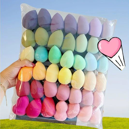Set of 3/10 Your Skin Icon beauty sponges for makeup blending, in various colors and shapes, for flawless foundation application.