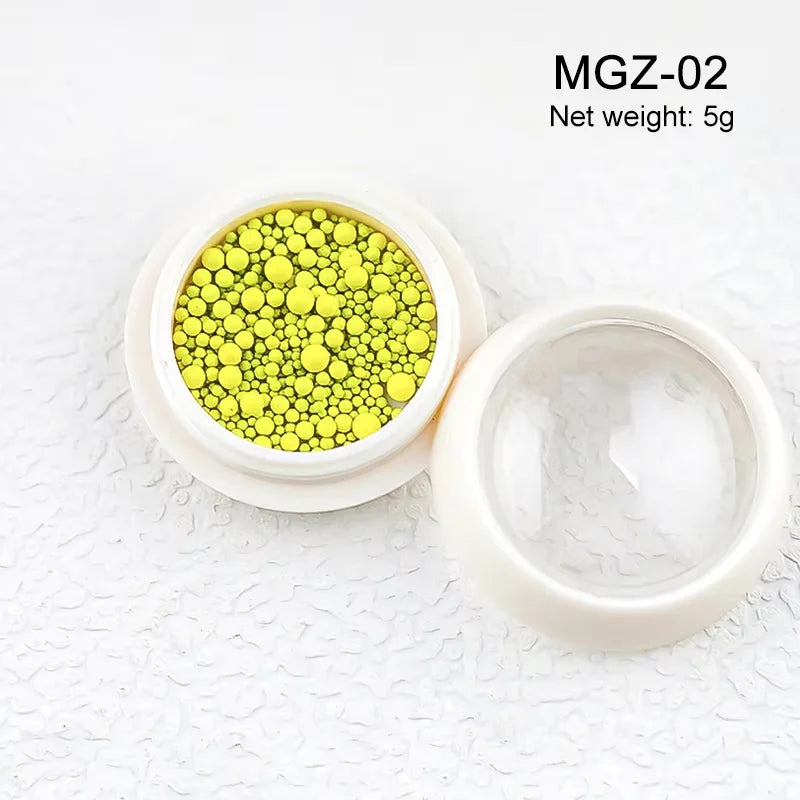 White acrylic flower nail art decorations with mixed size rhinestones and colorful gems for DIY manicure designs.