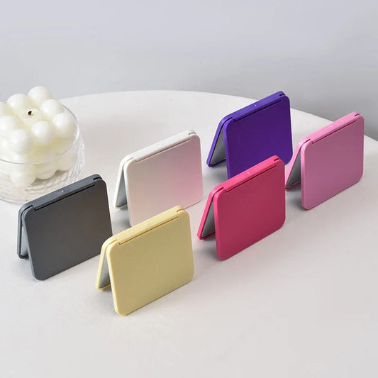 Blushimmer 2-face square portable makeup mirror with cute girl design, double-sided compact mirror in multiple colors.