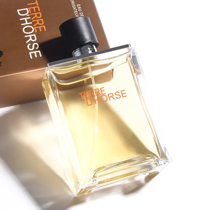 Blushimmer 50ml men's cologne perfume with fresh, spicy, woody, and earthy tones, long-lasting scent for dating and everyday wear.