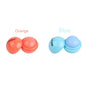 Blushimmer cute ball-shaped lip balm in pastel pink with a non-stick cup, showing its hydrating and soothing lip plumper design.