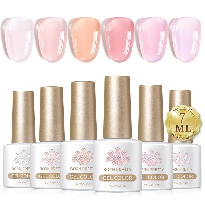 Six bottles of Blushimmer Born Pretty crystal amber gel nail polish set in jelly pink and nude shades for winter manicures.