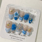 Set of 10 French almond press-on false nails by Blushimmer with floral design, wearable stick-on nail tips for women.