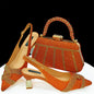 Elegant women's shoes and matching bag set with rhinestones by EdleessFashion, showcasing luxurious style and sparkling details.