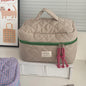 Blushimmer Airfriend pink makeup bag with soft fabric, featuring cute cosmetic and toiletry compartments for women’s travel organization.