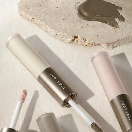 Blushimmer Judydoll dual head highlighter and contour stick with liquid matte and gloss finishes for face and nose shaping.