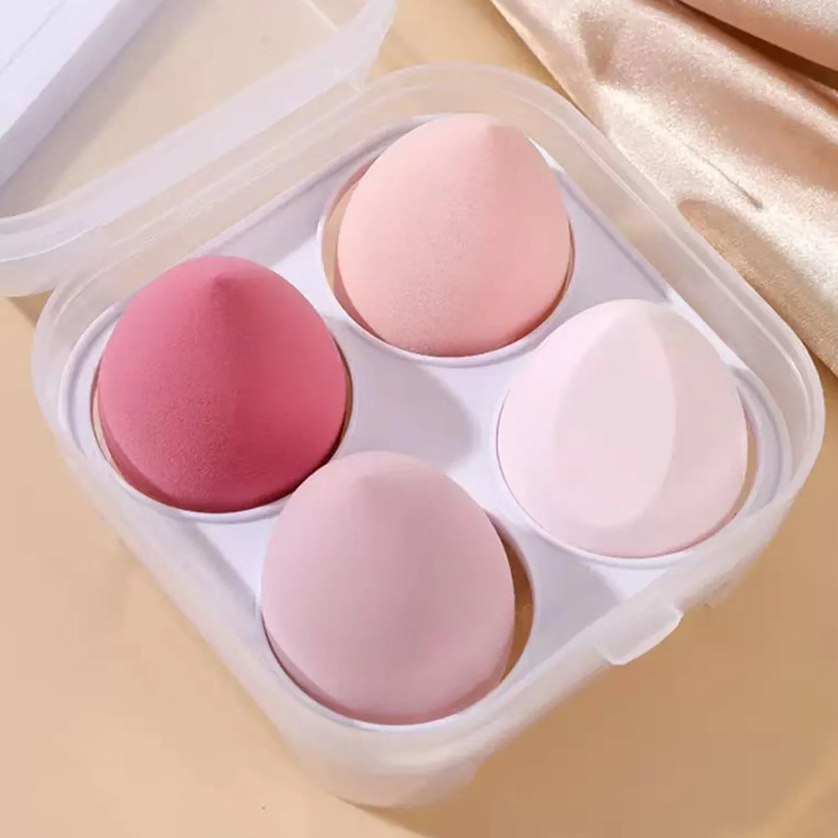 Set of four Blushimmer makeup sponge puffs for foundation, powder, and liquid makeup, with a travel-friendly storage box.