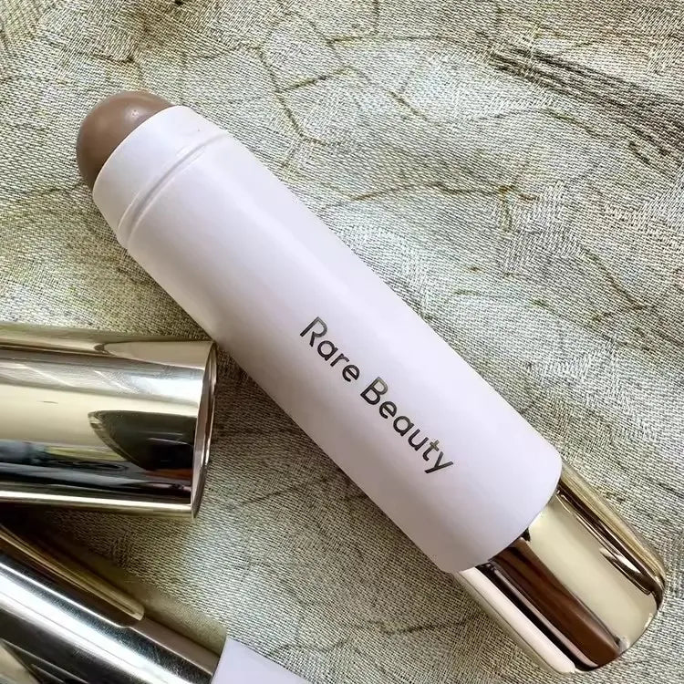 Rare Beauty Soft Pinch Liquid Bronze Contour Stick for natural nose shadow and face highlighting on all skin tones.