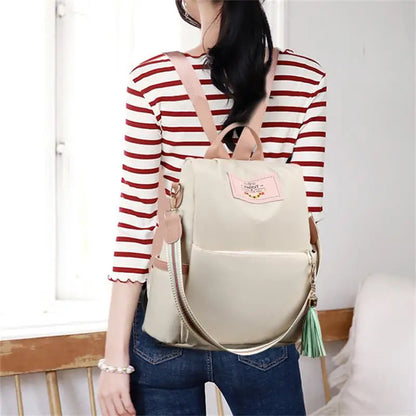 OBA women's large capacity shoulder backpack made of durable Oxford cloth with multiple compartments and adjustable straps.