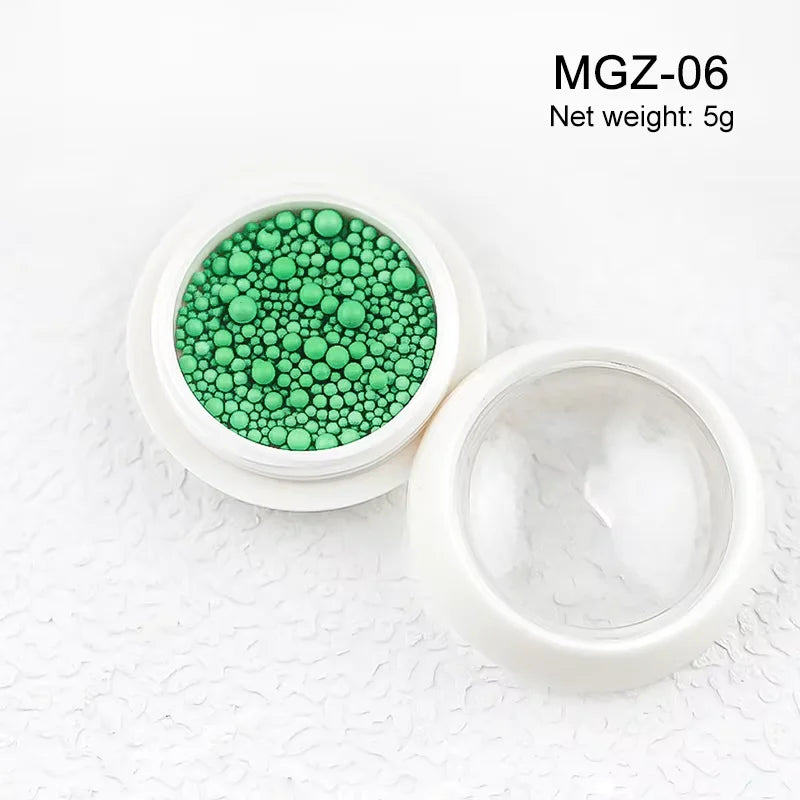 White acrylic flower nail art decorations with mixed size red and blue rhinestones for DIY manicure, from Blushimmer.