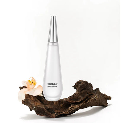 Elegant 100ml women's floral eau de parfum by Blushimmer featuring lotus, rose, peony, amber, musk, and woody notes.