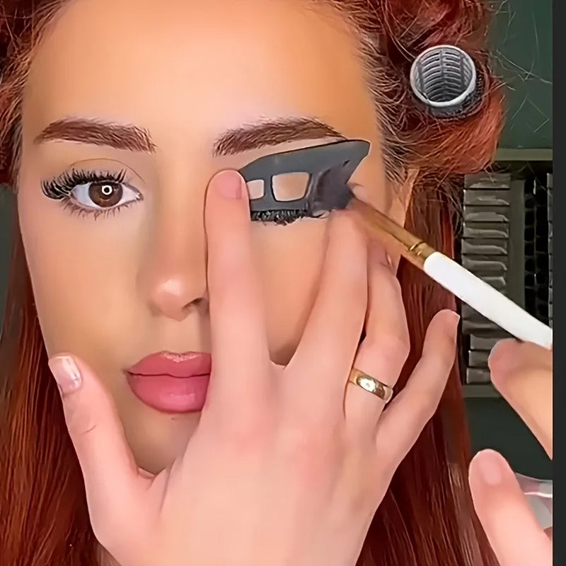 Blushimmer Eye Makeup Assistant with two eyeshadow brushes, makeup templates, and molds for precise eyeshadow application.