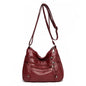 Red women's multi-layer leather shoulder crossbody bag by LPO with multiple compartments and adjustable strap.