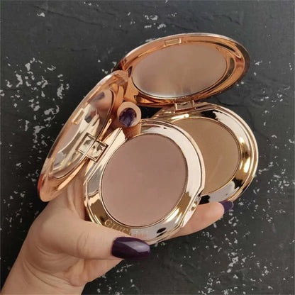 Blushimmer contour palette with mirror, featuring shadow powders, bronzer, nose shadow, and facial concealer for makeup.