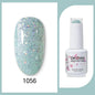 Blushimmer Clou Beaute 15ml neon red, black, white, green semi-permanent gel nail polish with velvet top coat on a nail display.