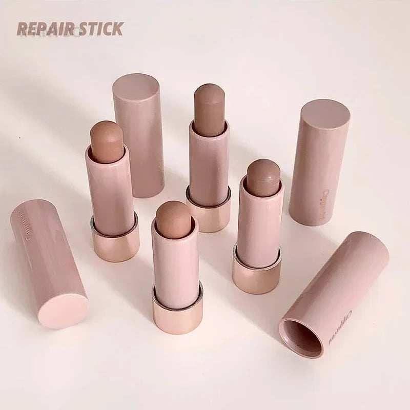 Gray and brown bronzer contouring stick by Blushimmer with waterproof, moisturizing cream texture for face shadowing and concealer application.