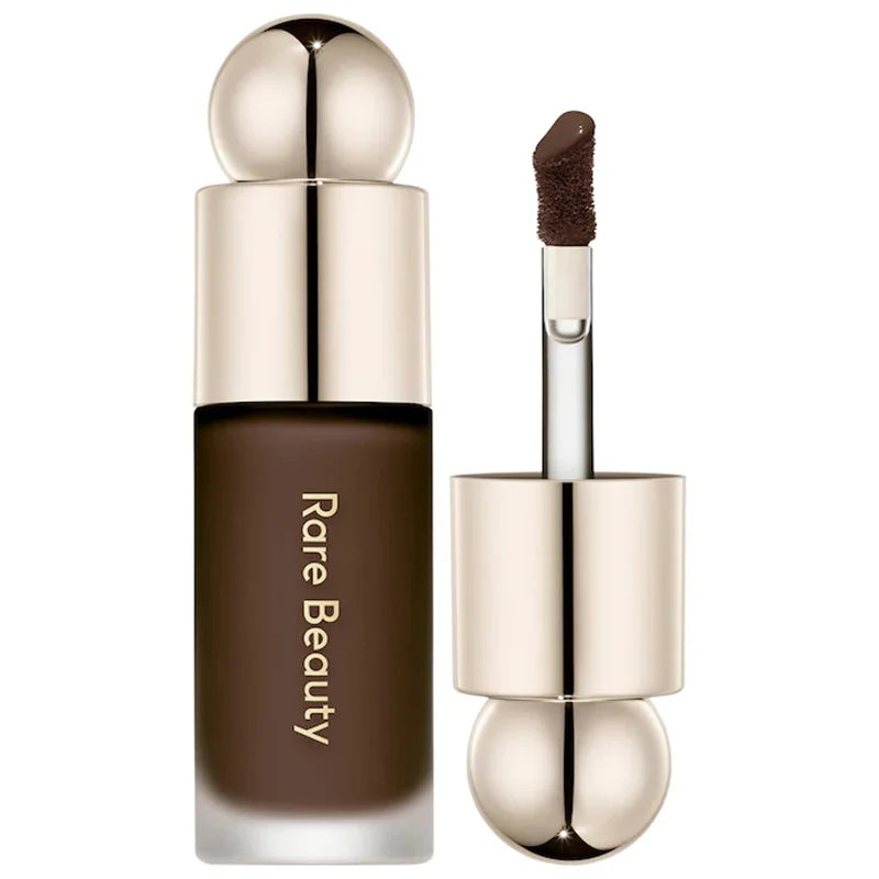 Rare Beauty 3D face contour liquid bronzer by Blushimmer, with smooth, waterproof formula for natural nose shadow and brightening makeup.