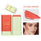 Blushimmer makeup blush stick in bright coral, waterproof cream formula with high color payoff on smooth skin.