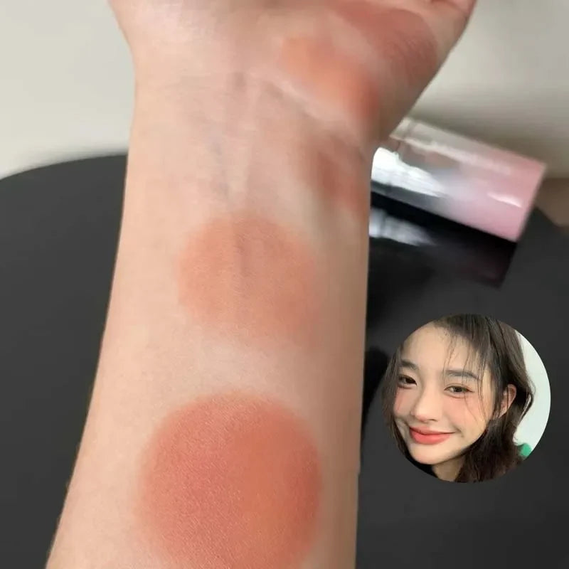 Blushimmer HERORANGE liquid blush in a natural, low-saturation matte shade, designed for enhancing a natural complexion.