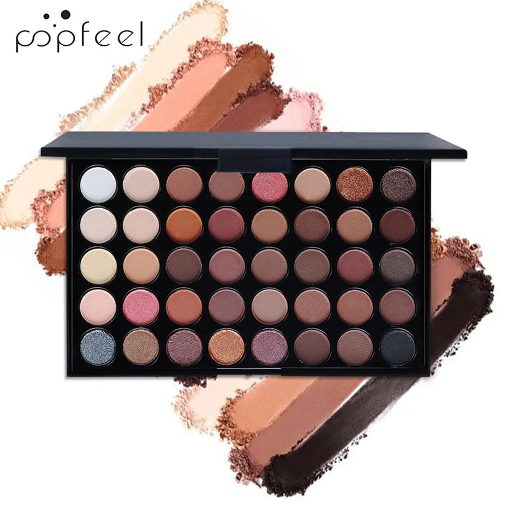 Blushimmer all-in-one makeup kit gift set with eyeshadow palette, foundation, lip gloss, blush, brushes, and eyeliner in mixed colors.