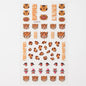 Close-up of Blushimmer Lovely Cat Nail Decals featuring 3D cartoon dog and puppy designs on self-adhesive nail art stickers.