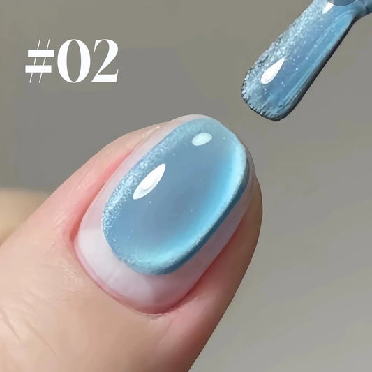 Blue and green cat eye gel nail polish by Blushimmer, featuring ocean bubble design, perfect for spring and summer nail art.