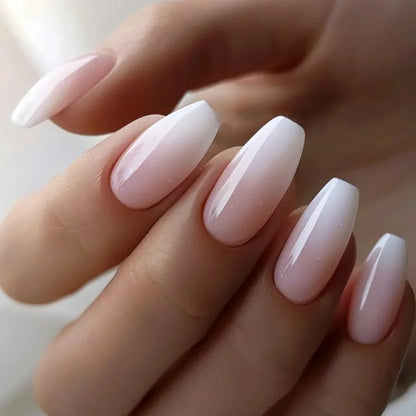 Set of 24 Blushimmer square head fake nails with pink and white gradient, short full cover tips with jelly glue for elegant French press look.
