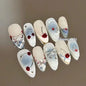 Set of 10 Blushimmer French almond press-on nails with floral design, wearable fake nails for women, including Uñas Postizas and nail tips.