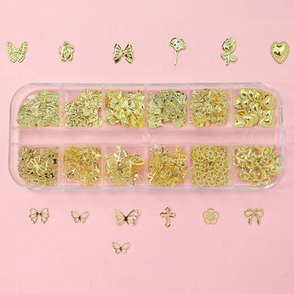 Set of 120 gold bow and butterfly nail charms with shiny star accents, perfect for luxurious nail art decorations.