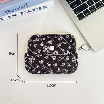Blushimmer cute cartoon small travel cosmetic bag with lipstick, earphone, and card compartments, ideal for makeup and accessories.