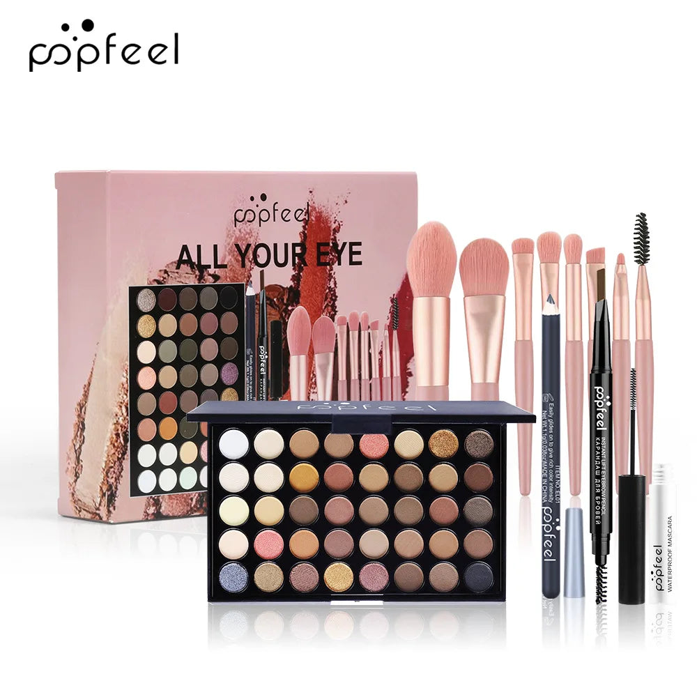 Blushimmer all-in-one makeup kit with eyeshadow palette, foundation, lip gloss, blush, brushes, and eyeline in mixed colors.