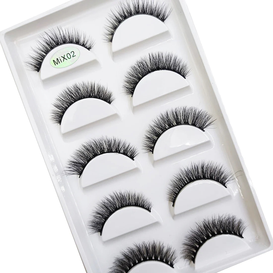 Five pairs of natural 3D mink false eyelashes by Blushimmer, featuring full lash bands and a flared cat-eye style for makeup.