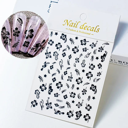 White and black 3D hibiscus flower nail sticker by Blushimmer, adhesive floral decals with pink and golden petals for nail art decoration.