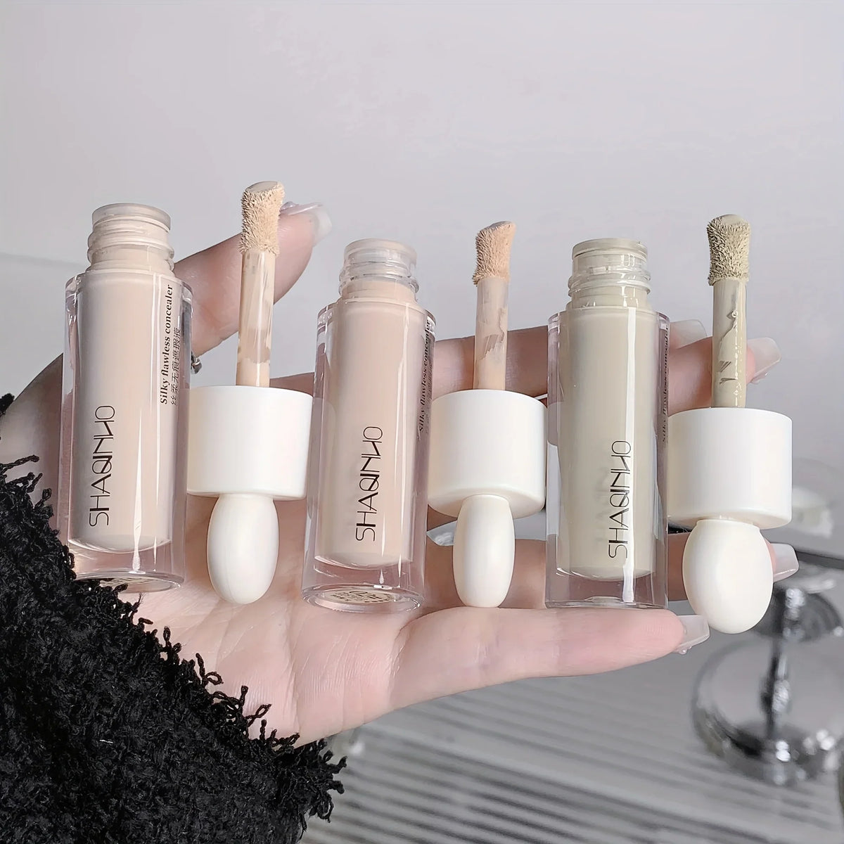 Blushimmer Flawless Finish Liquid Concealer in a tube, full coverage for blemishes, dark circles, and freckles, with smooth application