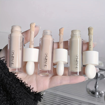 Blushimmer Flawless Finish Liquid Concealer in a tube, full coverage for blemishes, dark circles, and freckles, with smooth application