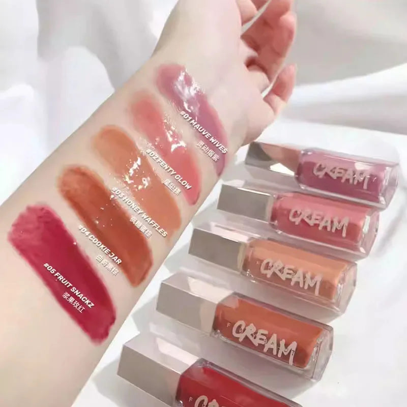 Fenty Beauty mauve lip gloss in a nude pink, showcasing a glossy, waterproof liquid lipstick with a smooth lip stain finish.