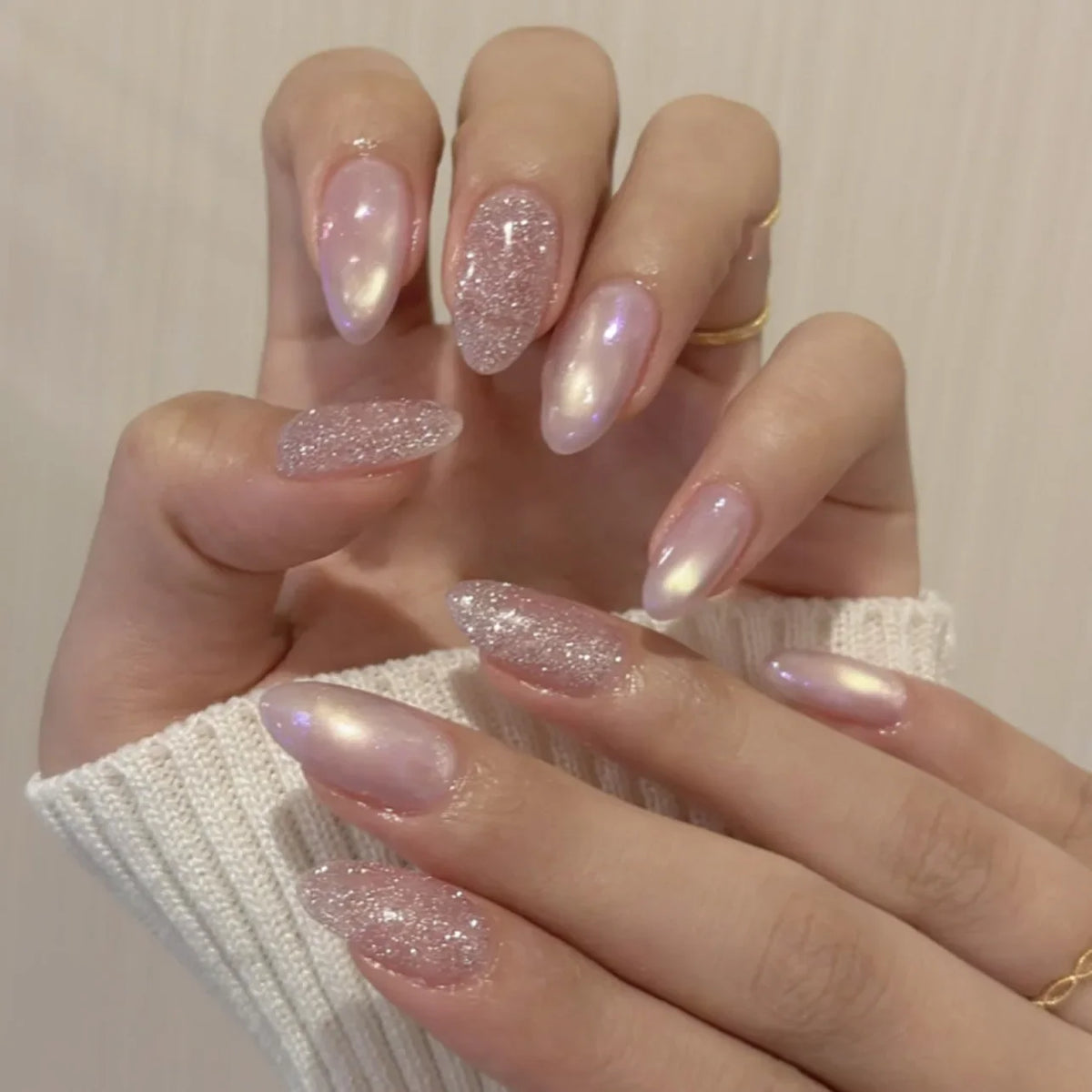 Set of 24 glossy red cat's eye press on nails by Blushimmer, almond-shaped false nails with nude color and detachable charms.