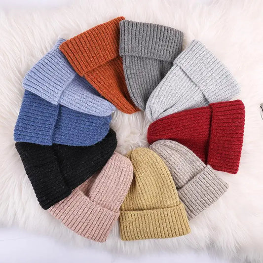 Cute knitted women's beanie hat with lining, warm wool, perfect for outdoor skiing and winter wear in a stylish design.