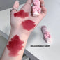 Blushimmer cute bear lip glaze and matte velvet lipstick with whitening lip cream, held in hand, showcasing colorful lip makeup.