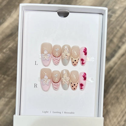 Set of 10 French almond press-on nails with floral design by Blushimmer, wearable faux nails for easy, stylish manicures.