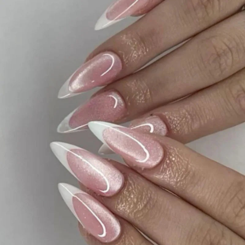 Set of 24 glossy red cat's eye press-on false nails with nude almond shape, by Blushimmer, featuring charms and detachable design.