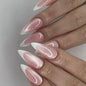 Set of 24 glossy red cat's eye press-on false nails with nude almond shape, by Blushimmer, featuring charms and detachable design.