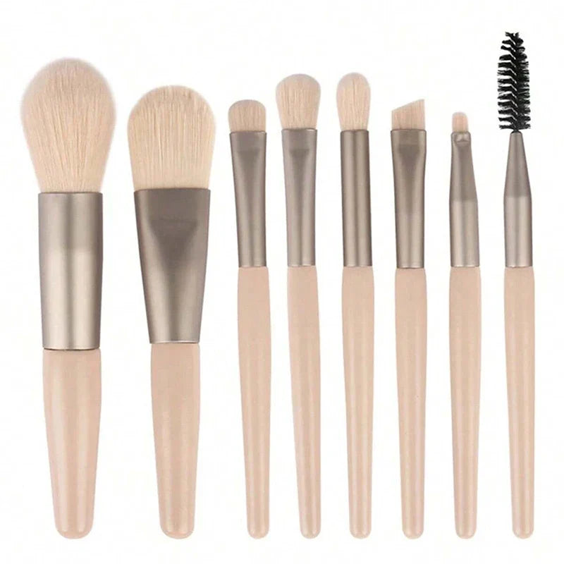 Set of 13 Blushimmer makeup brushes including eyeshadow, foundation, and blush brushes in a soft makeup tools bag.