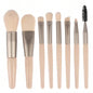 Set of 13 Blushimmer makeup brushes including eyeshadow, foundation, and blush brushes in a soft makeup tools bag.