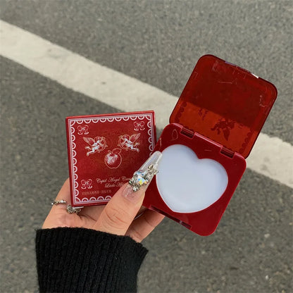 Blushimmer Cupid Eros unisex solid perfume with fresh floral, fruity scent featuring strawberry, gardenia, and apple notes.