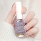 Blushimmer 10ml water-based semi-permanent nail polish in a clear bottle, showcasing vibrant colors for DIY long-lasting manicures.